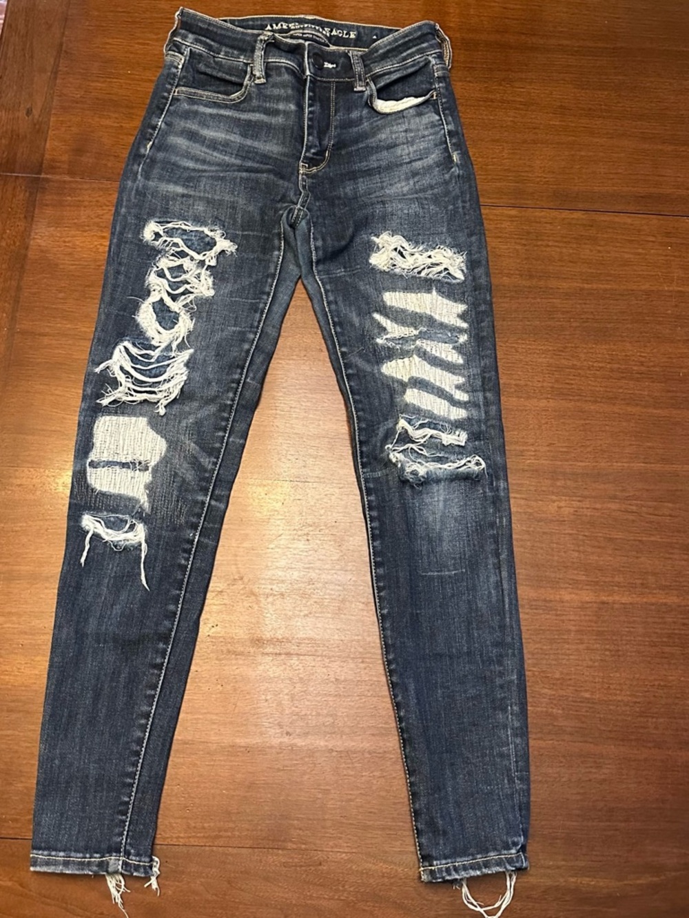American Eagle Outfitters Dark Blue Distressed Jegging size 0 Short